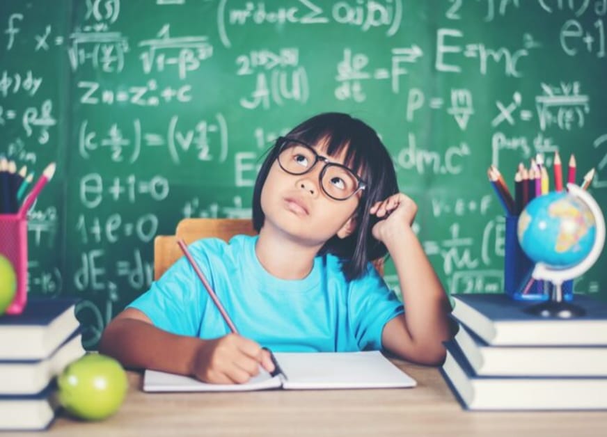 Girl doing math problems